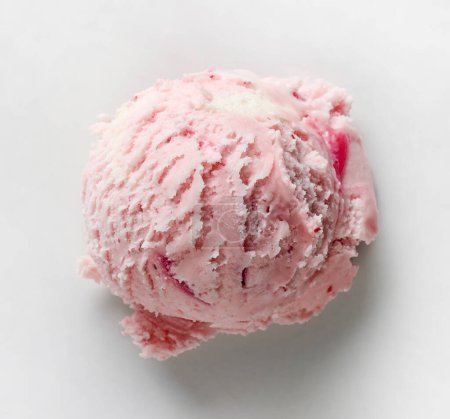 Photo for Pink ice cream ball on white background, top view - Royalty Free Image