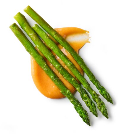 Photo for Vegetable puree and roasted asparagus isolated on white background, top view - Royalty Free Image