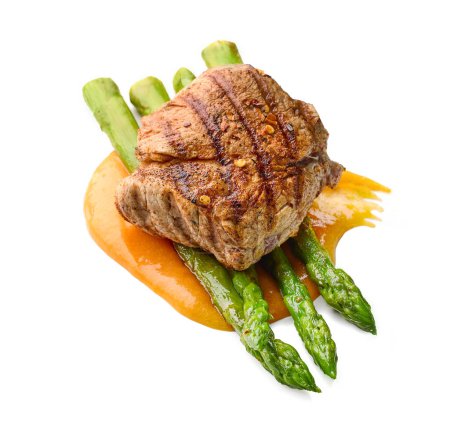 Téléchargez les photos : Grilled pork steak and asparagus isolated on white background - en image libre de droit