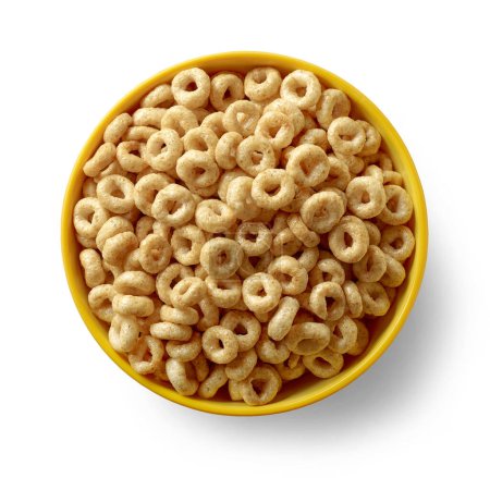 Foto de Tazón de desayuno anillos de miel de cereales aislados sobre fondo blanco, vista superior - Imagen libre de derechos