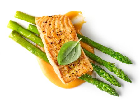 Photo for Grilled salmon fillet with asparagus and vegetable puree isolated on white background, top view - Royalty Free Image