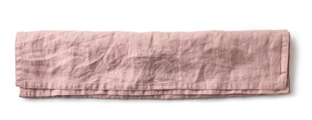 Téléchargez les photos : Serviette pliée en coton rose isolée sur fond blanc, vue de dessus - en image libre de droit