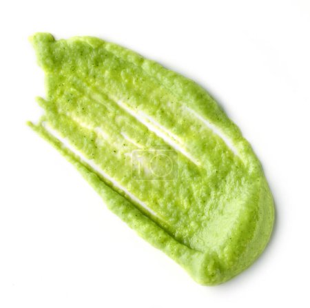 Foto de Green vegetable puree isolated on white background, top view - Imagen libre de derechos