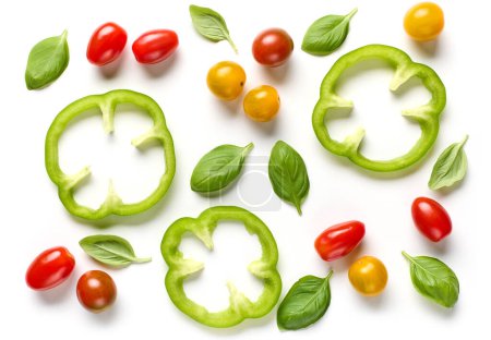 Photo for Flat lay composition of green paprika slices, colorful tomatoes and basil leaves isolated on white background, top view - Royalty Free Image
