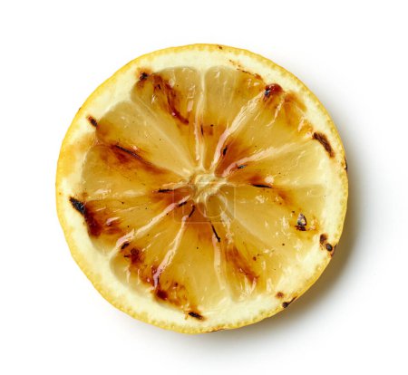 Foto de Rebanada de limón a la parrilla aislada sobre fondo blanco, vista superior - Imagen libre de derechos