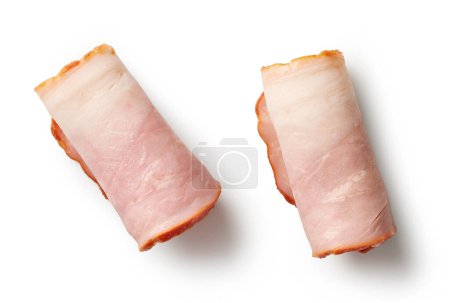 Foto de Rollos de carne de tocino de cerdo ahumado aislados sobre fondo blanco, vista superior - Imagen libre de derechos