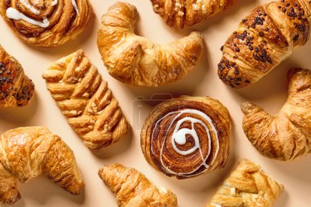 Photo for Assorted freshly baked pastries, top view - Royalty Free Image