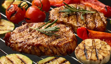 Photo for Freshly grilled juicy steaks and vegetables - Royalty Free Image