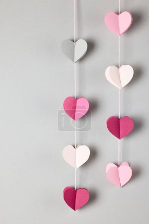 Photo for Colorful decorative paper hearts on grey background - Royalty Free Image