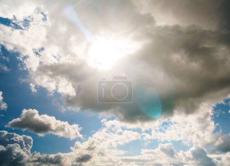 Photo for Sun and dramatic white clouds - Royalty Free Image