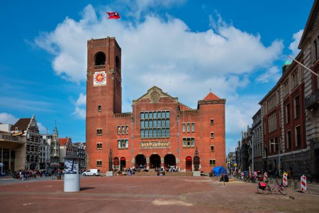 Photo for Amsterdam, Netherlands - May 7, 2017: View of Beursplein and Beurs van Berlage building - former commodity exchange building, now a venue for concerts, exhibitions and conferences - Royalty Free Image