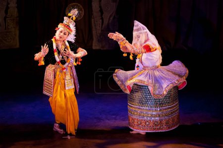 Photo for CHENNAI, INDIA - DECEMBER 12, 2009: Indian classical dance Manipuri preformance on December 12, 2010 in Chennai, India. Female is portraying Krishna character - Royalty Free Image