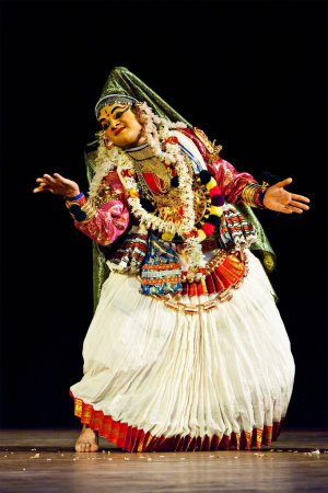 Photo for CHENNAI, INDIA - SEPTEMBER 7, 2009: Indian traditional dance drama Kathakali preformance on September 7, 2009 in Chennai, India. Female character - Royalty Free Image