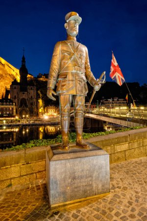 Photo for DINANT, BELIGUM - MAY 30, 2018: Bronze statue of Charles de Gaulle near the bridge where he was wounded in battle of Dinant in World War I - Royalty Free Image