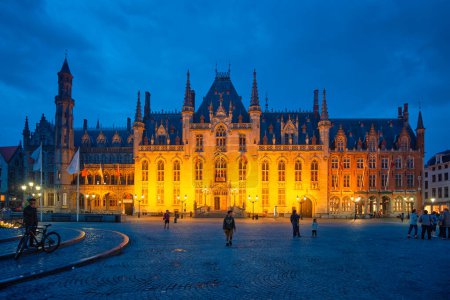 Photo for Bruges, Belgium - May 28, 2018: Famous tourist destination Grote markt square and Provincial Court building in Bruges, Belgium in the night - Royalty Free Image