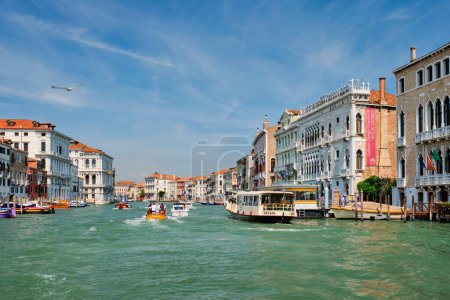 Photo for VENICE, ITALY - JULY 19, 2019: Boats and gondolas on Grand Canal, Venice, Italy - Royalty Free Image