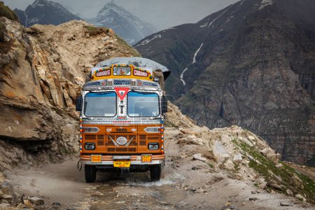 Photo for Rohtang-La, India - May 27, 2010: Indian decorated lorry on Manali-Leh road in Indian Himalayas near Rohtang La pass. Himachal Pradesh, India - Royalty Free Image
