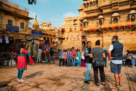 Photo for Jaisalmer, India - November 16, 2019: Tourist crowd in famous Rajasthan tourism attraction Jaisalmer Golden fort Sonar Quila. Jaisalmer, Rajasthan, India - Royalty Free Image