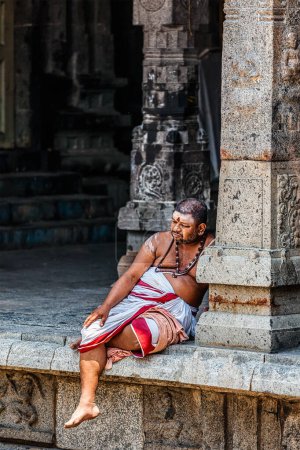 Photo for KANCHIPURAM, INDIA - SEPTEMBER 12, 2009: Unidentified temple brahmin in Ekambareswarar Temple, Kanchipuram. The city is a holy pilgrimage site for Hinduists - Royalty Free Image