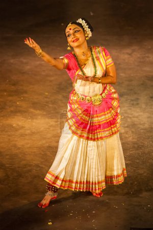 Photo for CHENNAI, INDIA - DECEMBER 12, 2009: Mohiniattam dance performed by female exponent in Chennai, India. Mohiniattam is a classical Indian dance form originating in Kerala state - Royalty Free Image