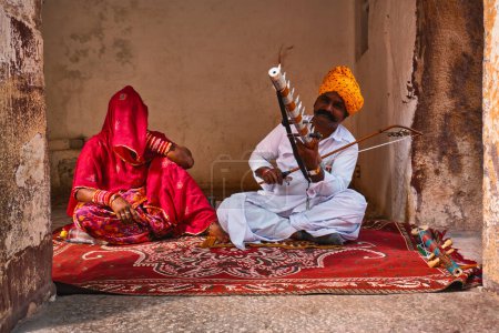 Jodhpur, India - November 13, 2019: Musicians playing in singing traditional folk Rajasthani songs and music in Mehrangarh fort, Rajasthan, India