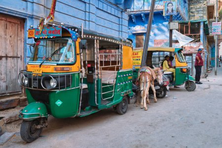 Photo for Jodhpur, India - November 13, 2019: Auto rickshaw tuk tuk in indian street is a very common transportation option in India used as taxi. Jodhpur, Rajasthan, India - Royalty Free Image