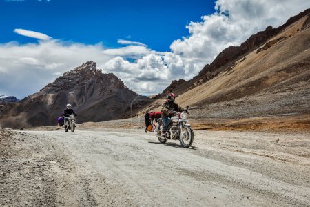 Photo for LADAKH, INDIA - SEPTEMBER 2, 2011: Bike tourists in Himalayas on famous high altitude Leh Manali Highway. Himalayan bike tourism is gaining popularity for tourists and bikers from all over the world - Royalty Free Image