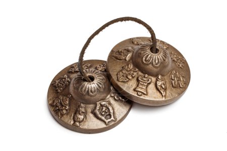 Photo for Tibetan Buddhist tingsha cymbals isolated on white - Royalty Free Image
