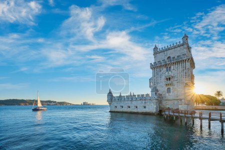 Photo for Belem Tower or Tower of St Vincent - famous tourist landmark of Lisboa and tourism attraction - on the bank of the Tagus River Tejo on sunset. Lisbon, Portugal - Royalty Free Image