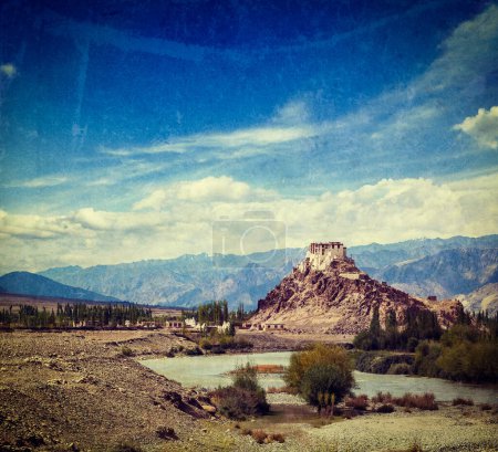 Photo for Vintage retro effect filtered hipster style travel image of Stakna Gompa - Buddhist monastery of the Drugpa sect in Leh district, Ladakh, India with grunge texture overlaid - Royalty Free Image