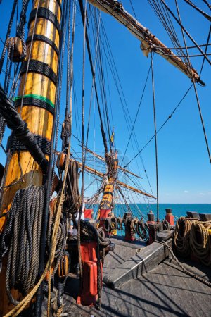 Photo for Deck with mast and ropes and bowspirit of wooden Age of sail sailing ship - Royalty Free Image