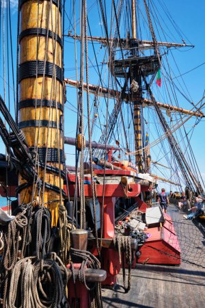 Photo for Lisbon, Portugal - September 6, 2022: Deck with masts and ropes of Gotheborg of Sweden - sailing replica of Swedish East Indiaman ship. It is one of world largest operational wooden sailing ships - Royalty Free Image
