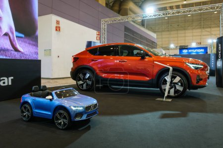 Photo for Lisbon, Portugal - May 12, 2023: Volvo C40 Recharge electric car and toy car on display at ECAR SHOW - Hybrid and Electric Motor Show - Royalty Free Image