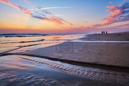 Photo for Atlantic ocean after sunset with surging waves at Fonte da Telha beach, Costa da Caparica, Portugal - Royalty Free Image