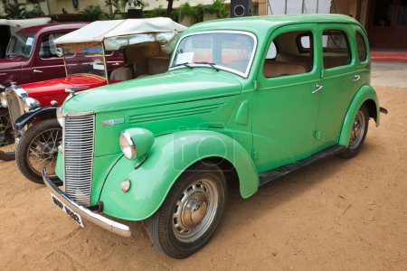 Photo for CHENNAI - INDIA - JULY 24, 2011: Ford Prefect 1952 (retro vintage car) on Heritage Car Rally 2011 of Madras Heritage Motoring Club at Egmore on July 24, 2011 in Chennai, India - Royalty Free Image