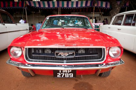 Photo for CHENNAI - INDIA - JULY 24, 2011:Ford Mustang (retro vintage car) on Heritage Car Rally 2011 of Madras Heritage Motoring Club at Egmore on July 24, 2011 in Chennai, India - Royalty Free Image