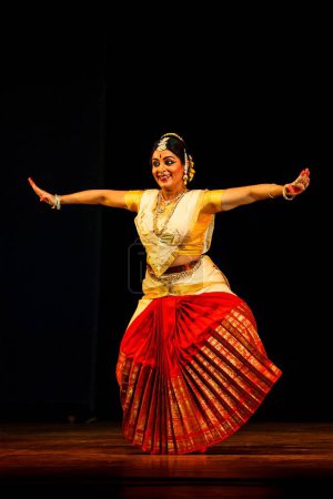 Photo for CHENNAI, INDIA - AUGUST 31, 2009: Bharata Natyam (Bharatanatyam - classical Indian dance) performance in Chennai, Tamil Nadu, India. Exponent plays Draupadi character of Mahabharata epic - Royalty Free Image