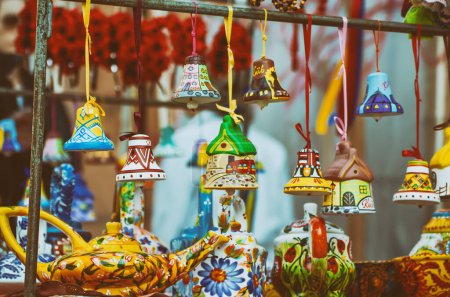 Photo for Souvenir ceramic bells at the market, local national craft of Ukraine - Royalty Free Image
