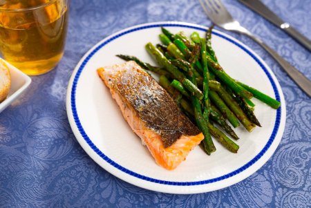 Delicious baked trout with grilled asparagus, healthy dinner