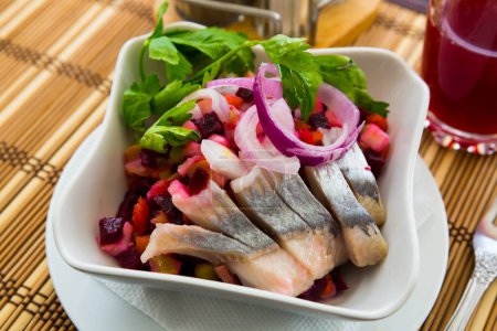 Vinaigrette salad with salted herring. Russian dish