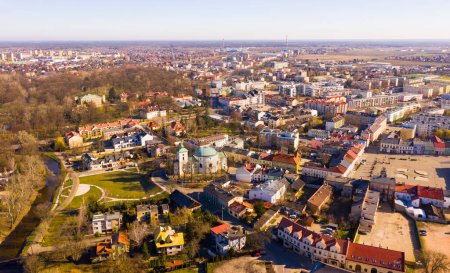 View from drone of Skierniewice cityscape on sunny spring day, Lodz Province, Poland