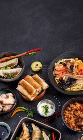 Photo for Traditional Asian food. Various of asian meals on dark background. Assorted dishes of traditional cuisine. Top view, copy space - Royalty Free Image