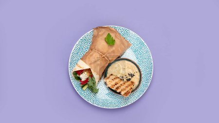 Greek gyros on pink background. Traditional food.  Top view, copy space