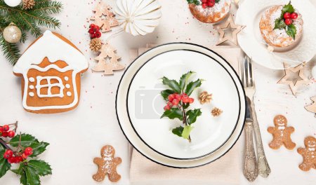 Photo for Christmas table setting with empty plate on light background. Winter Holidays conept. Top view. Flat lay - Royalty Free Image