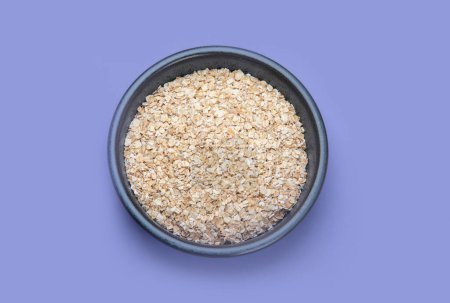 Photo for Oatmeal on color background. Top view. - Royalty Free Image