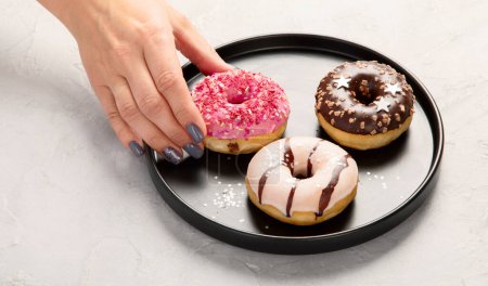 Téléchargez les photos : Different type of donuts. top view, copy space - en image libre de droit