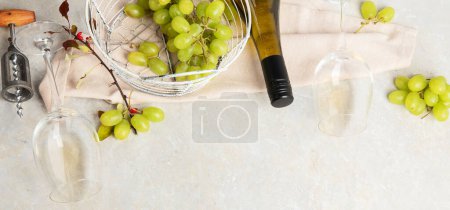 Photo for Flat-lay of white wine in glasses and corkscrews on a white background, top view, wide composition. Wine bar, winery, wine degustation concept. Panorama with copy space. - Royalty Free Image