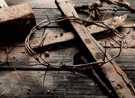 Photo for Crucifixion Of Jesus Christ - Cross With Hammer Bloody Nails And Crown Of Thorns. Top view. - Royalty Free Image