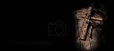 Photo for Crucifixion Of Jesus Christ - Cross With Hammer Bloody Nails And Crown Of Thorns.  Black background with copy space - Royalty Free Image