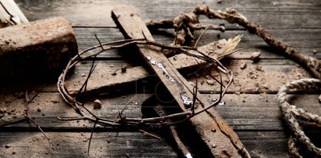Photo for Crucifixion Of Jesus Christ - Cross With Hammer Bloody Nails And Crown Of Thorns. - Royalty Free Image